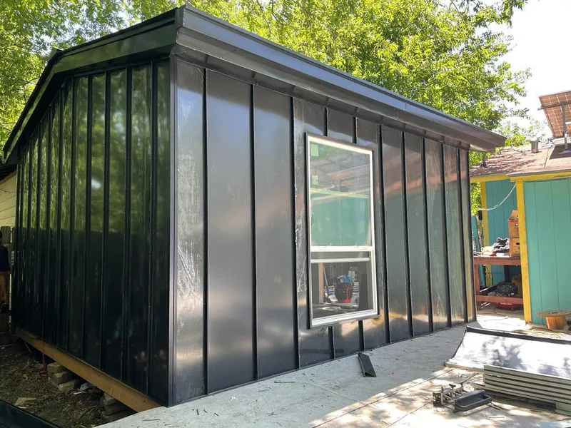 Black standing seam metal wall panels for Metal Roof Installation in Danville