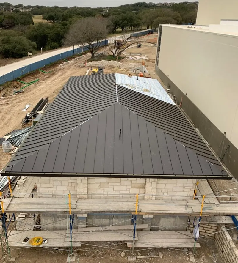 Metal roof new construction with scaffolding in Danville